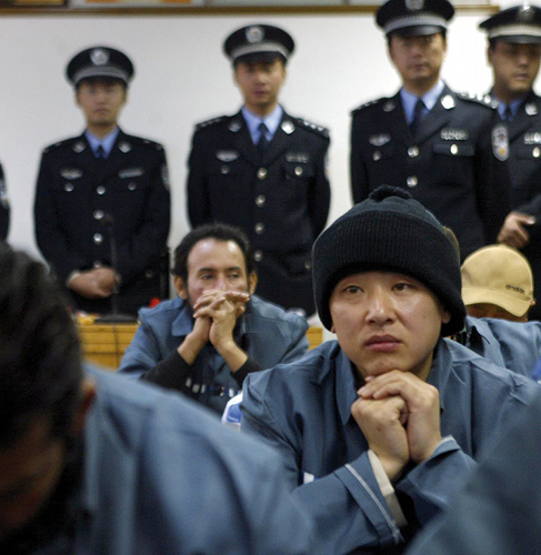 Chinese Christian just after arrest. Connections vol. 7, no. 1 & 2 (July 2008), cover.